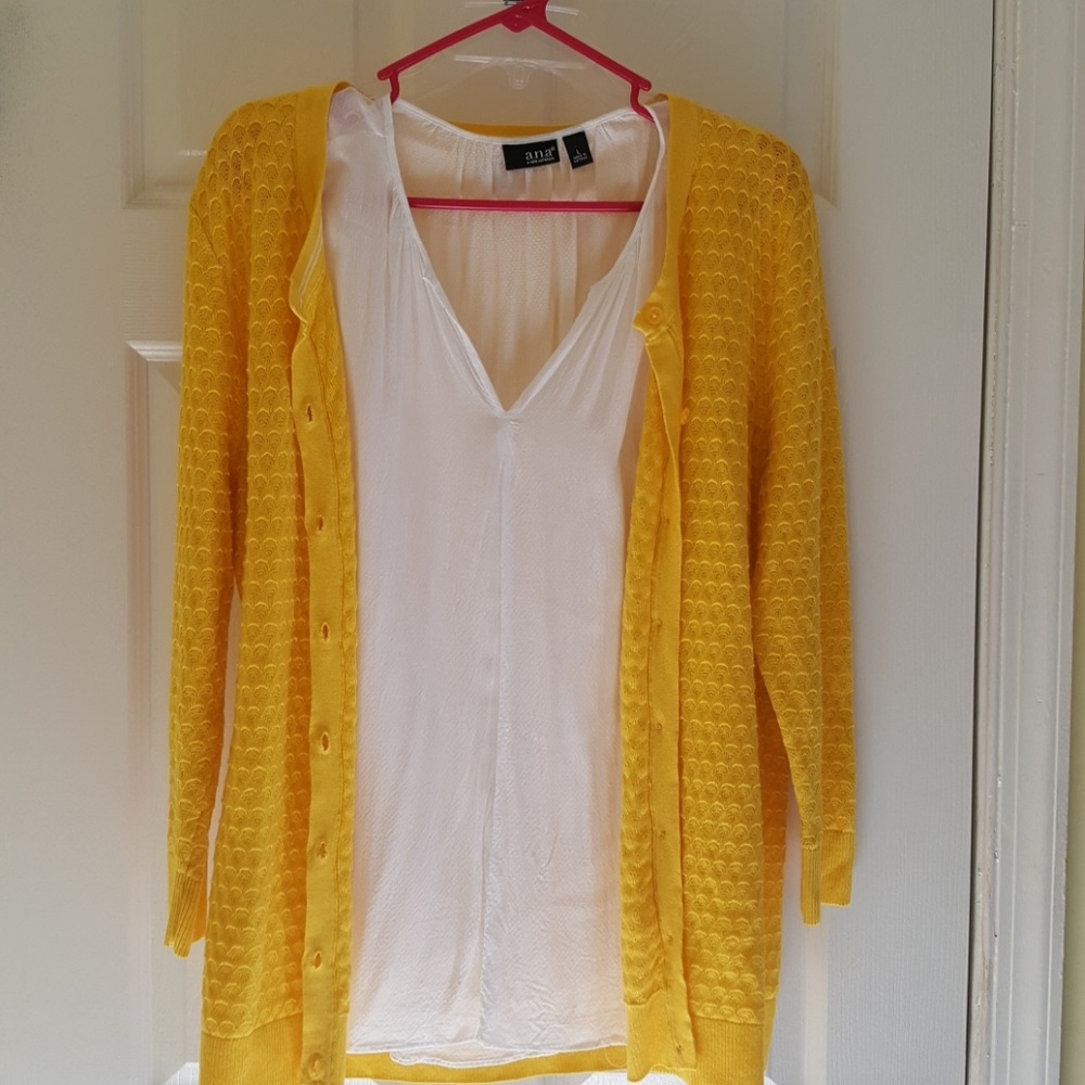 Flowy white sleeveless blouse